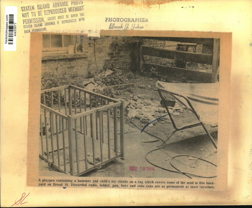 1968 Press Photo Playpen and Debris at Home Backyard on Broad Street - sia33977