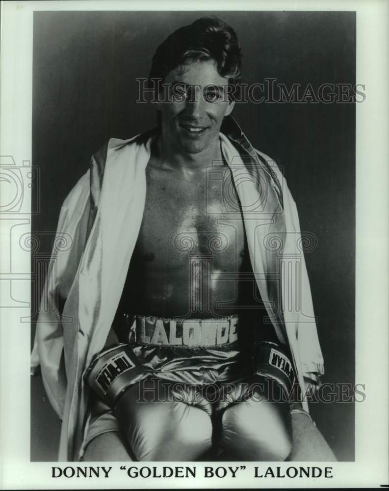 Press Photo Boxer Donny &quot;Golden Boy&quot; Lalonde in ring gown - sis00420- Historic Images