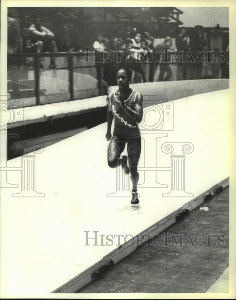 Press Photo A Wisconsin track athlete approaches a jumping pit - sis00931- Historic Images