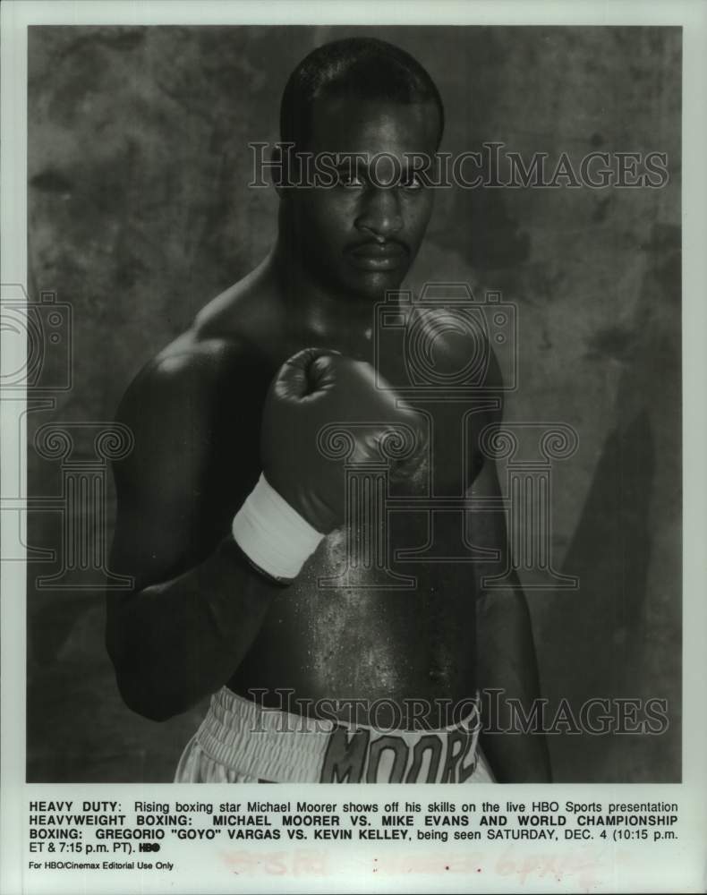 Press Photo Rising boxing star Michael Moorer poses for camera - sis00940- Historic Images