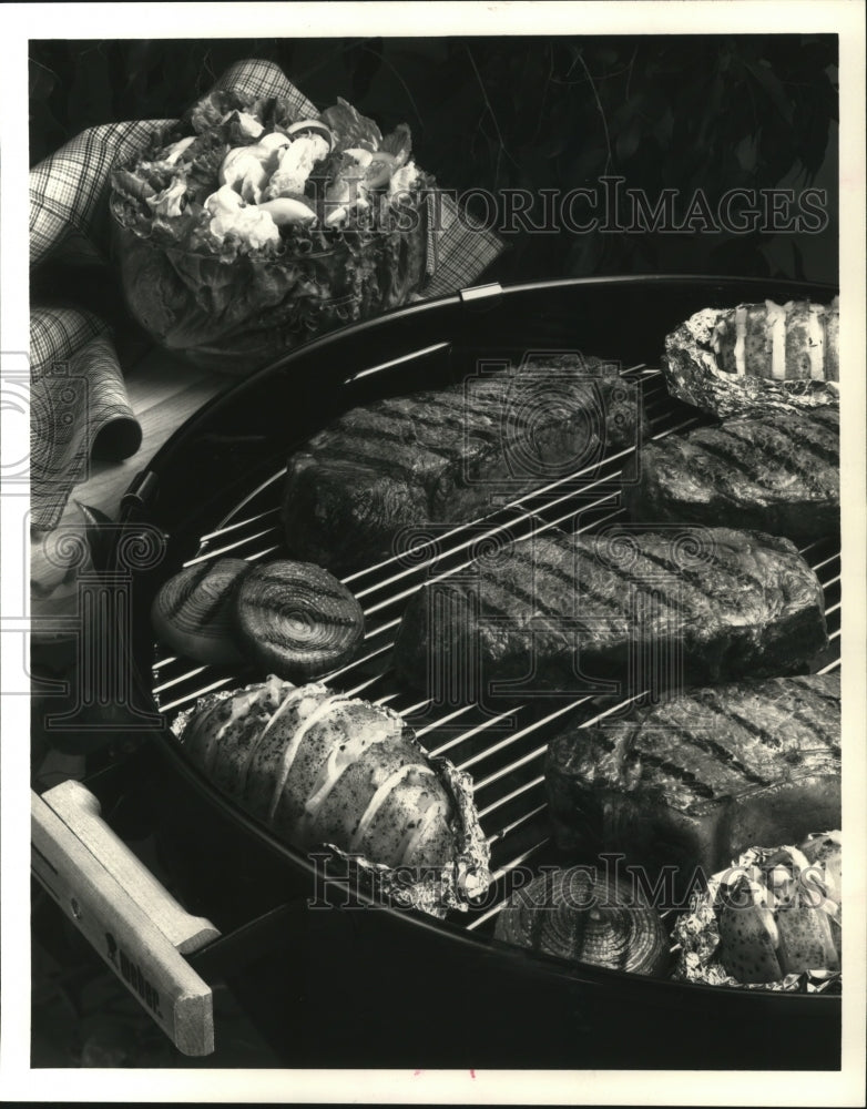 1994 Press Photo The crowning touch to be barbecue season is steak - spa32950- Historic Images