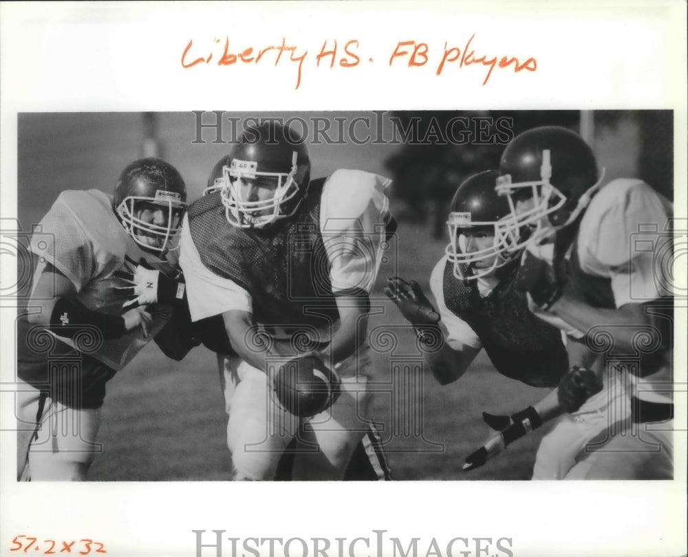 1992 Press Photo Liberty High School football players in action during practice- Historic Images