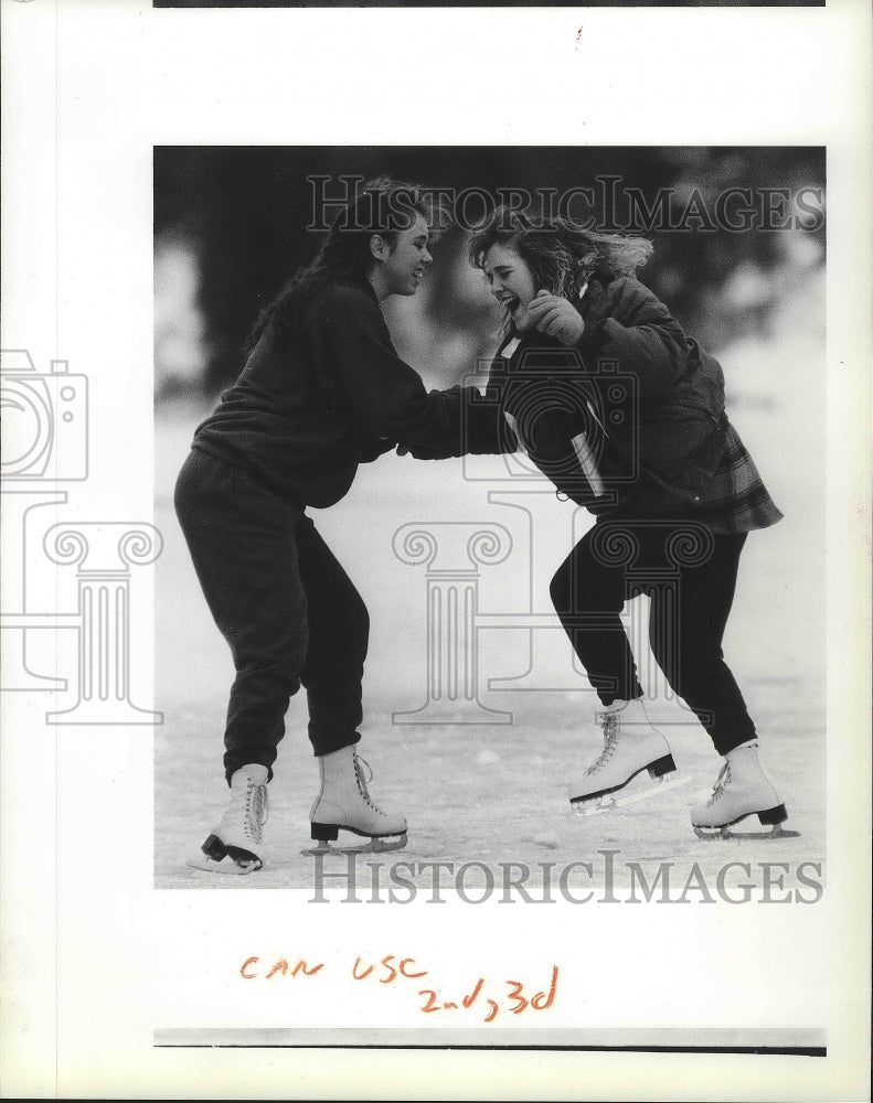 1991 Press Photo Angel Mullikin &amp; Sara Haugen enjoy skating at Fernan Lake- Historic Images