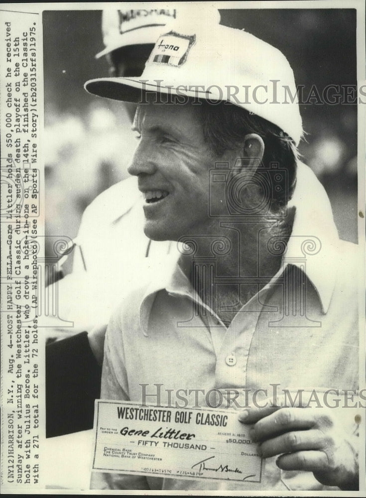 1975 Press Photo Golf champ, Gene Littler, holds his $50,000 check after his win- Historic Images