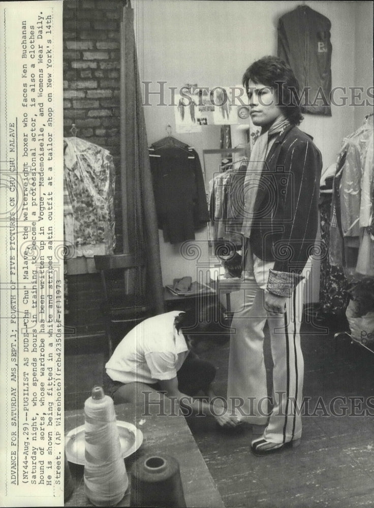 1973 Press Photo Welterweight Boxer Chu Chu Malave Being Fitted at Tailor Shop- Historic Images