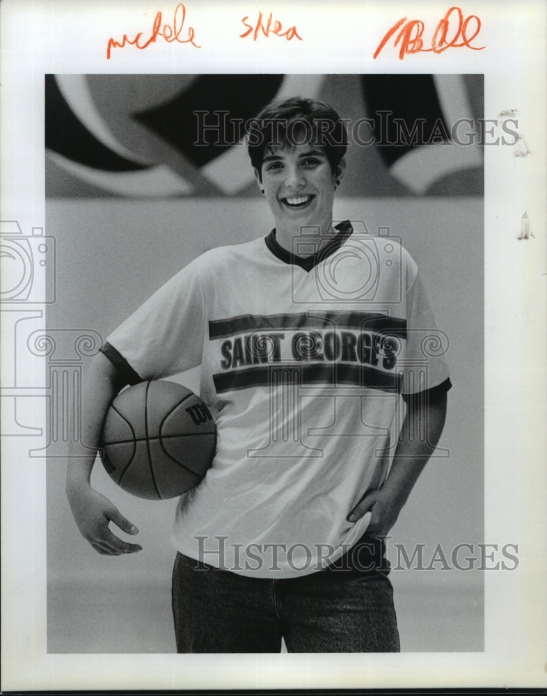 1990 Press Photo Michelle Shea, Saint George&#39;s basketball, poses in team jersey- Historic Images