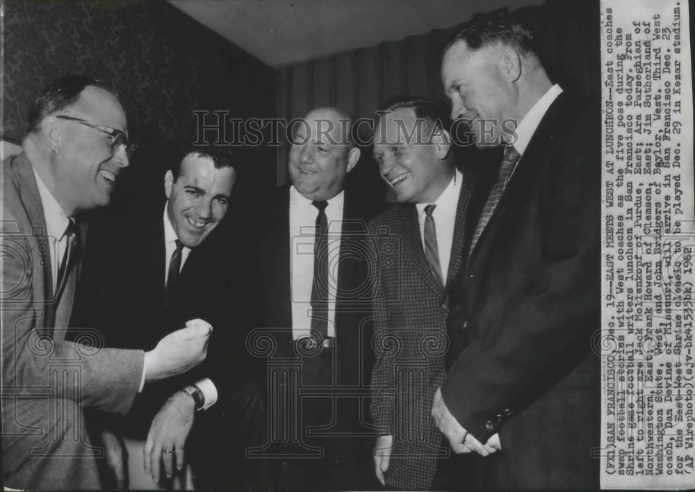 1962 Press Photo East coaches swap football stories with West coaches at lunch- Historic Images