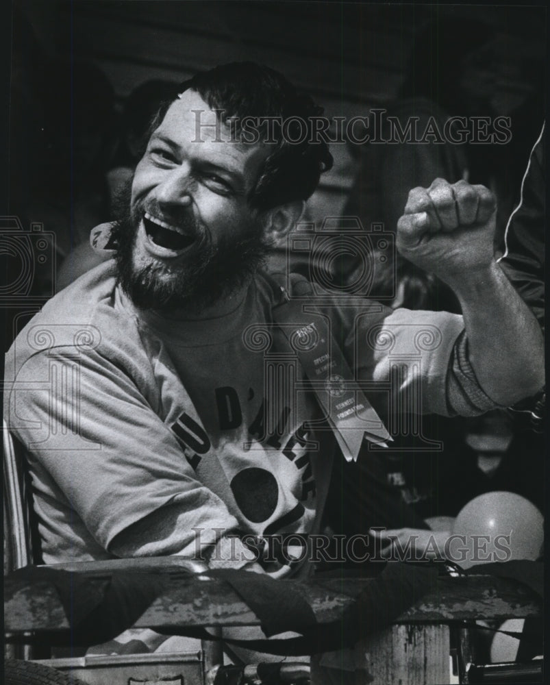 1983 Press Photo Special Olympian Steve Alhent pumps his fist - sps15658- Historic Images