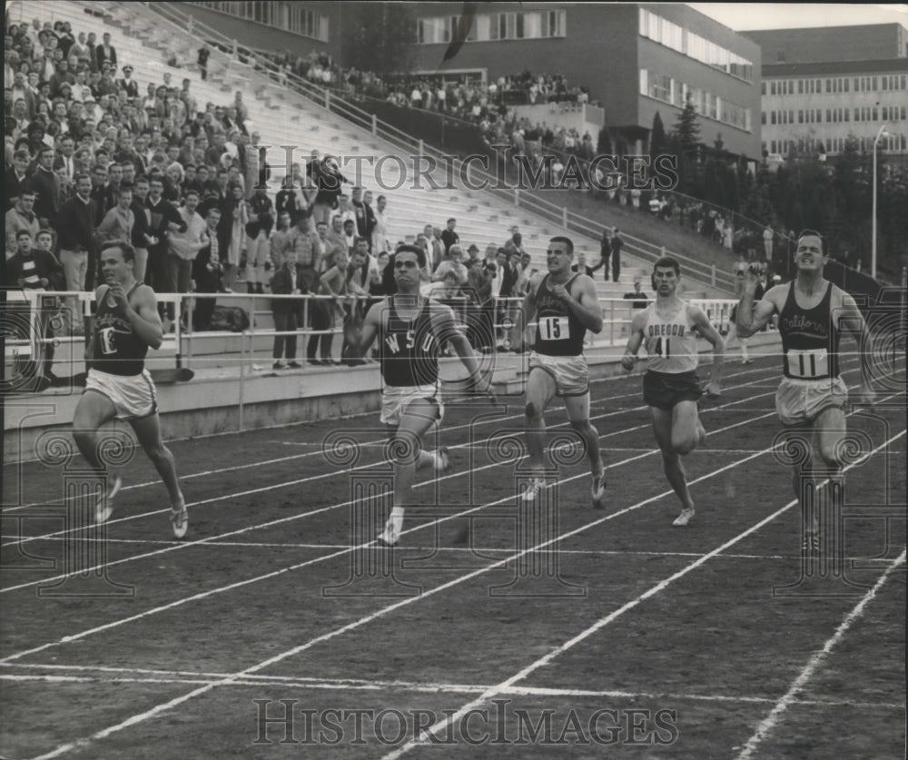 1965 Press Photo WSU track runner, Dick Hickman, hits the tape - sps16952- Historic Images