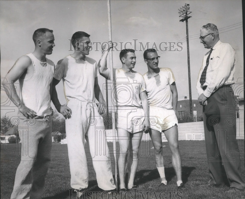 1957 Press Photo EWU Athletic director, Red Reese, with track athletes- Historic Images