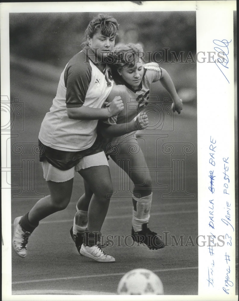 Press Photo #14 Darla Bare and #23 Jamie Foster push for the soccer ball- Historic Images