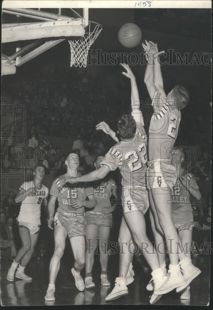 1958 Press Photo Central Valley Basketballers Shooting a Hoop - sps19778- Historic Images