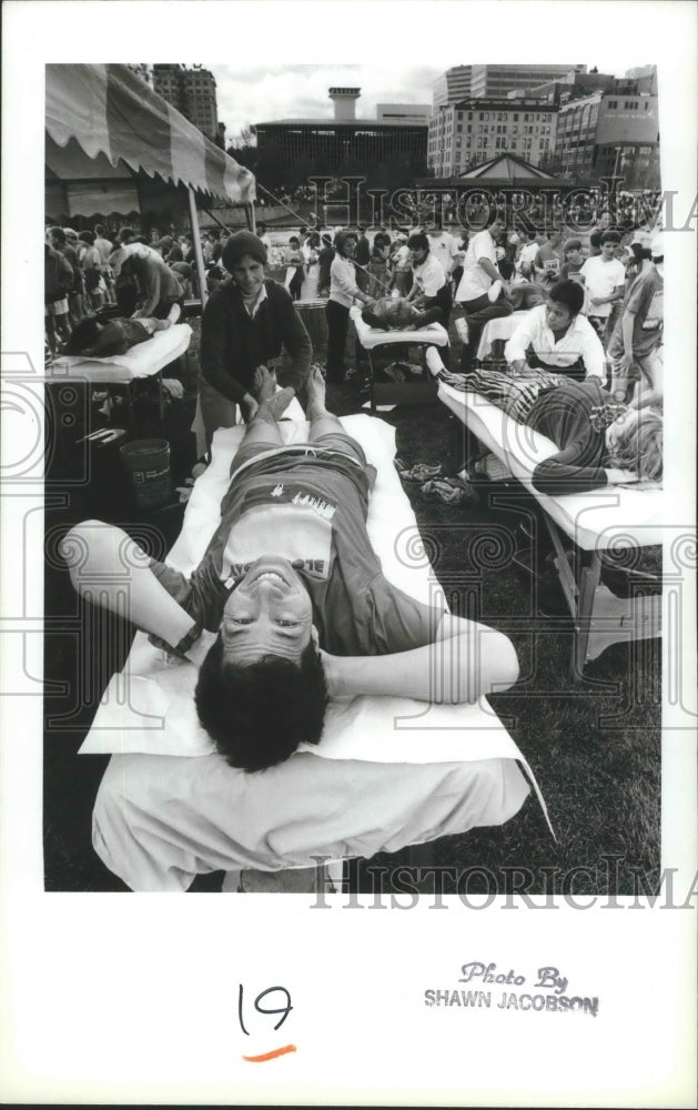 1988 Press Photo Runner gets a massage after finishing the Bloomsday race- Historic Images