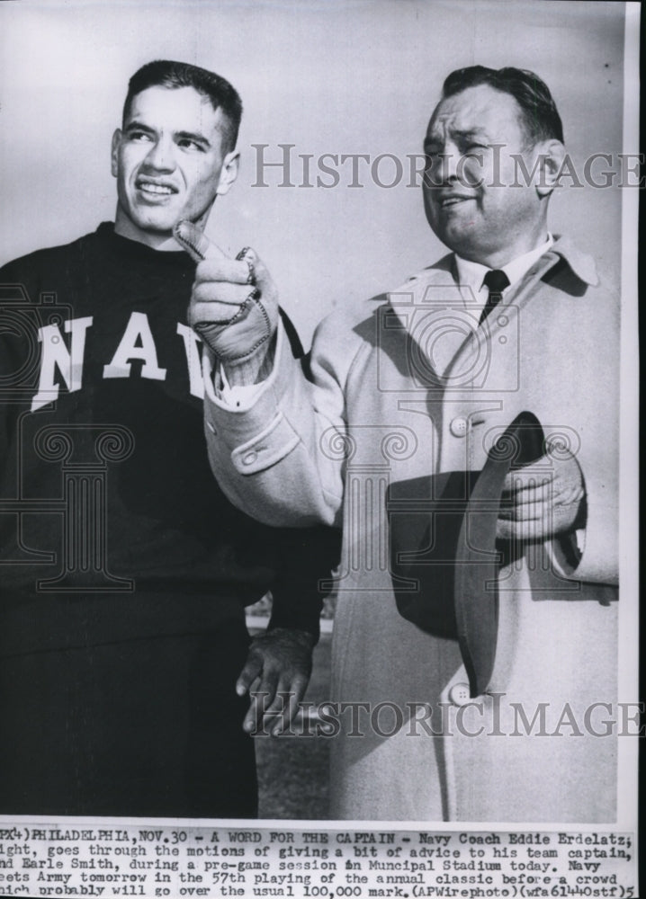 1956 Press Photo Navy Coach Eddie Erdelatz talks with team captain. - spw04135- Historic Images