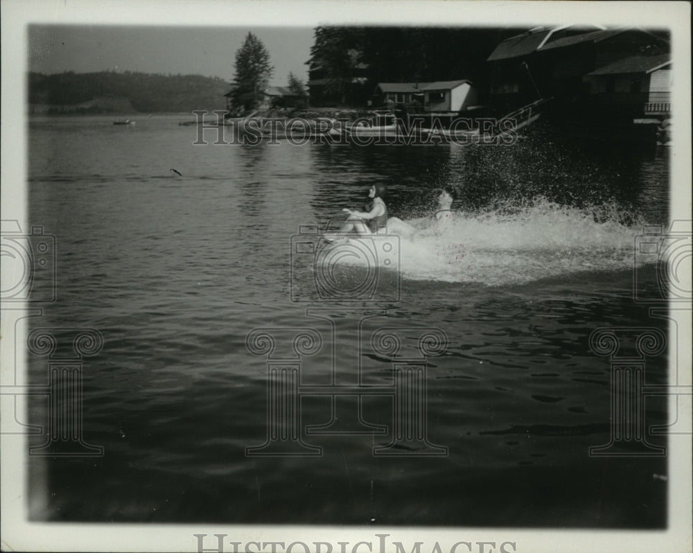 1935 Press Photo Lake Scene, Couple on the Lake - spx17710- Historic Images