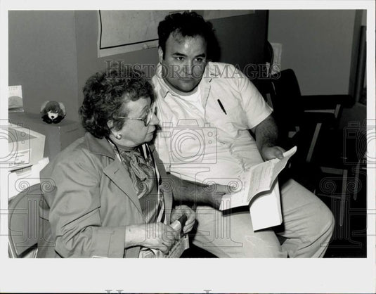 1992 Press Photo Ann Fattini and Mark Stevens review taxes in Springfield, MA- Historic Images