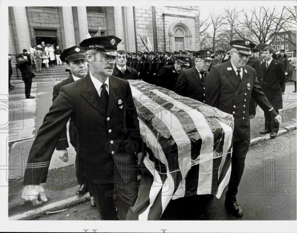 Press Photo Springfield firemen carry fireman Warren Colby from Lady of Hope.- Historic Images