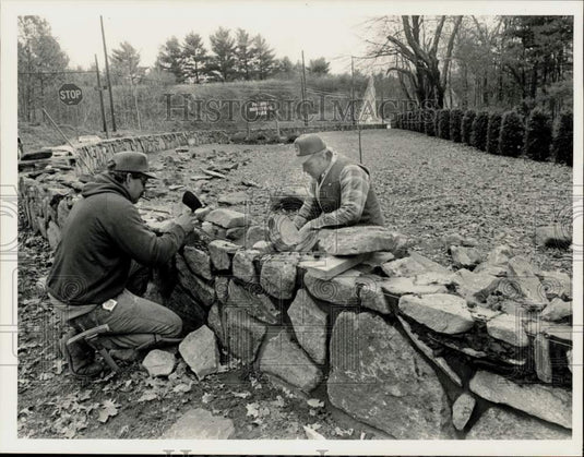 1988 Press Photo Workers building stone wall at Palmer Industrial Park, MA- Historic Images