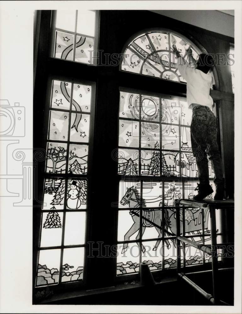 1989 Press Photo Chris Sikoski puts up stained glass window at Suffield school- Historic Images