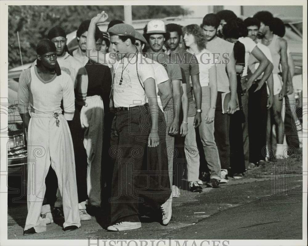 Press Photo Guardian Angels on Armory Street taking orders from Jeff Ferguson.- Historic Images