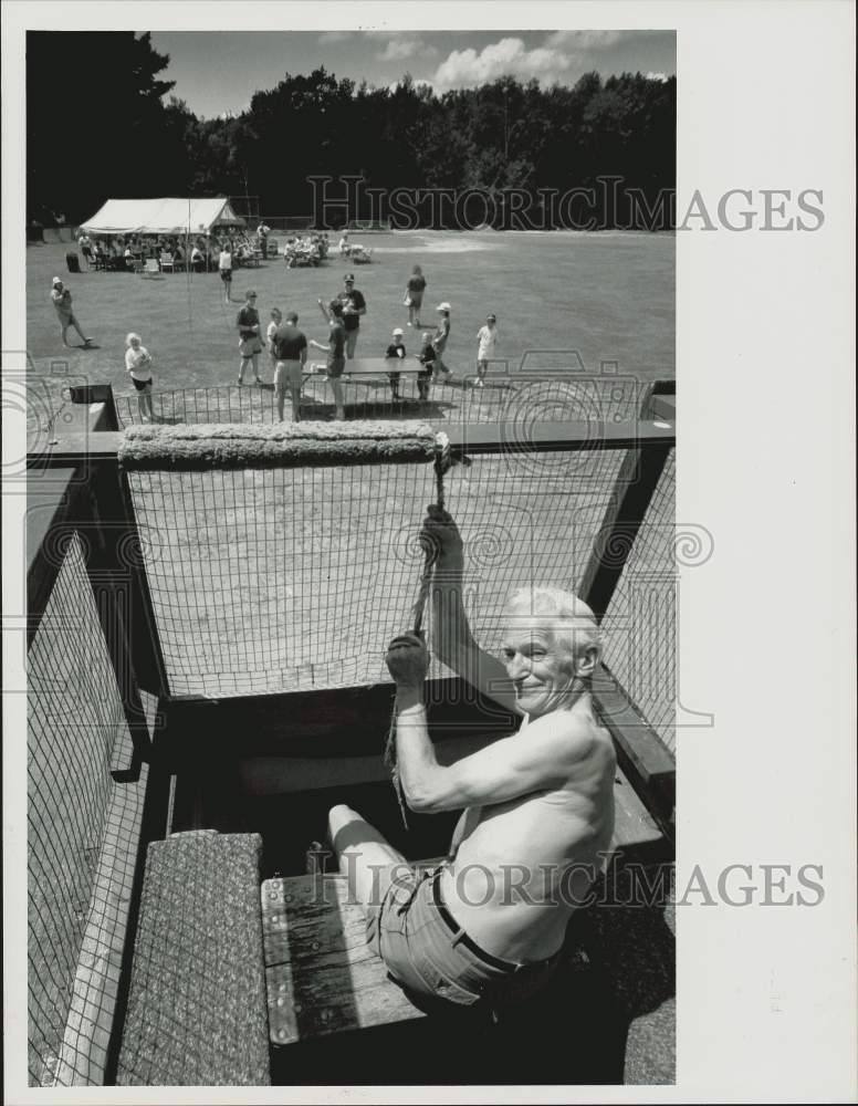 1990 Press Photo Goshen Fire Chief Francis Dresser in dunking booth at picnic.- Historic Images