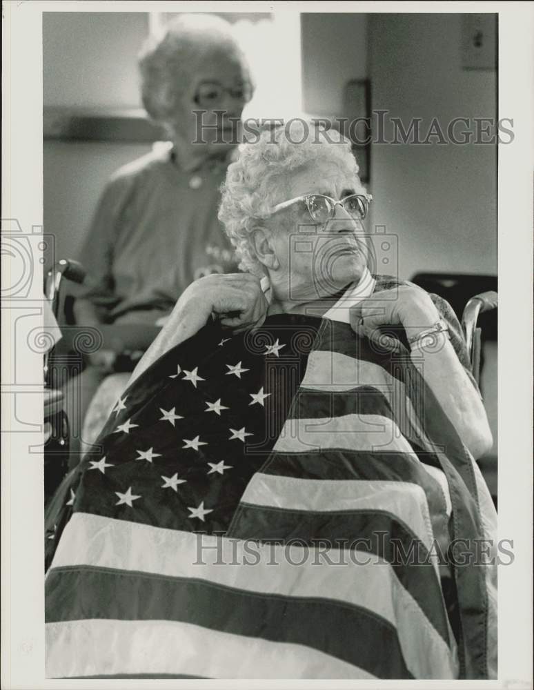 1989 Press Photo Angeline Pezzini holds the American Flag at Senior Olympics, MA- Historic Images