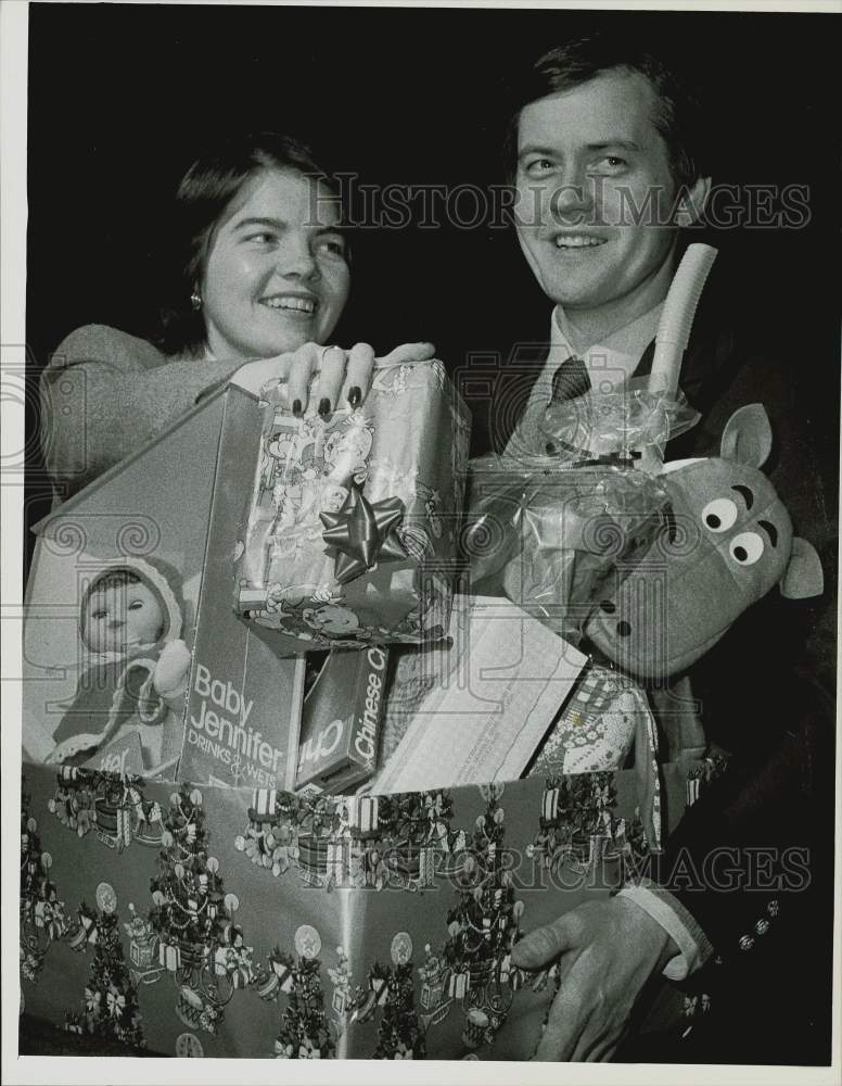 Press Photo City Councilors Mary Hurley/Robert Markel Donate Toys, MA- Historic Images