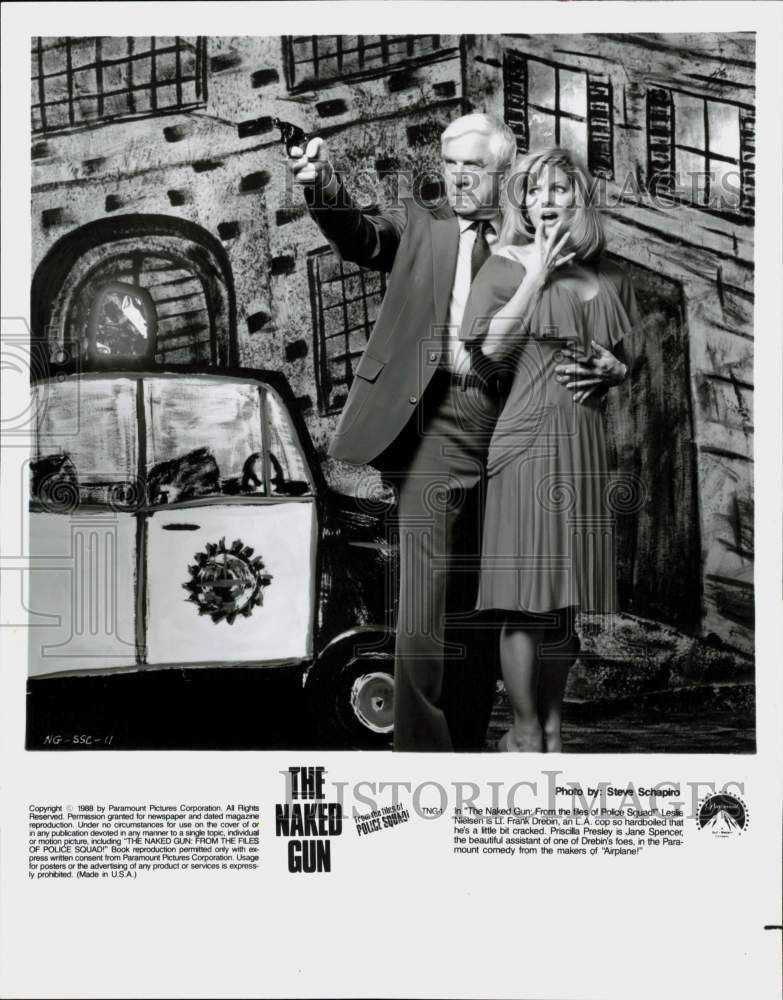 1988 Press Photo Leslie Nielsen &amp; Priscilla Presley in &quot;The Naked Gun&quot;- Historic Images