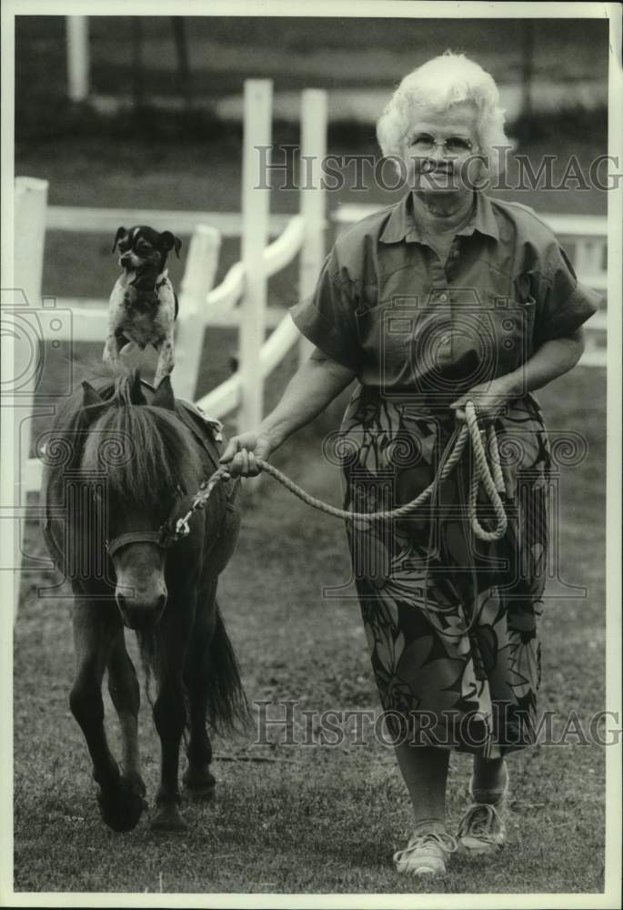 Press Photo Louise Chave Walks Miniature Horse with Dog Riding on Its Back- Historic Images