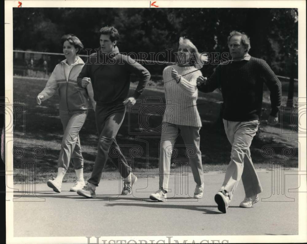 1987 Press Photo Four People Walking for Exercise - sya64889- Historic Images