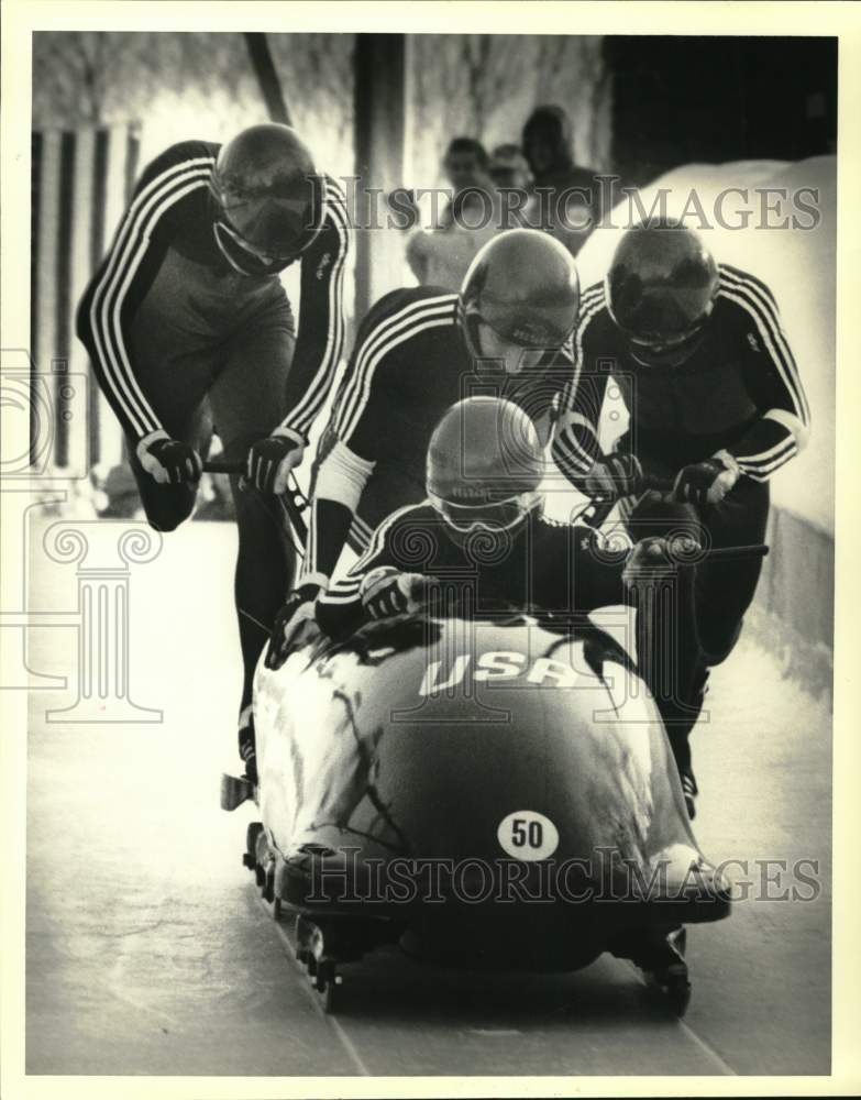 1984 Press Photo Jeff Jost, Hal Hoy &amp; Team Compete in Lake Placid Bobsled Event- Historic Images