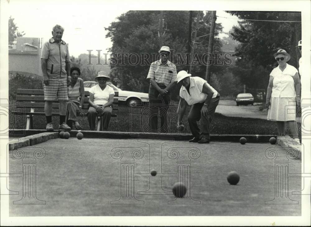 Press Photo Group Plays Bocce in Park - sya71421- Historic Images