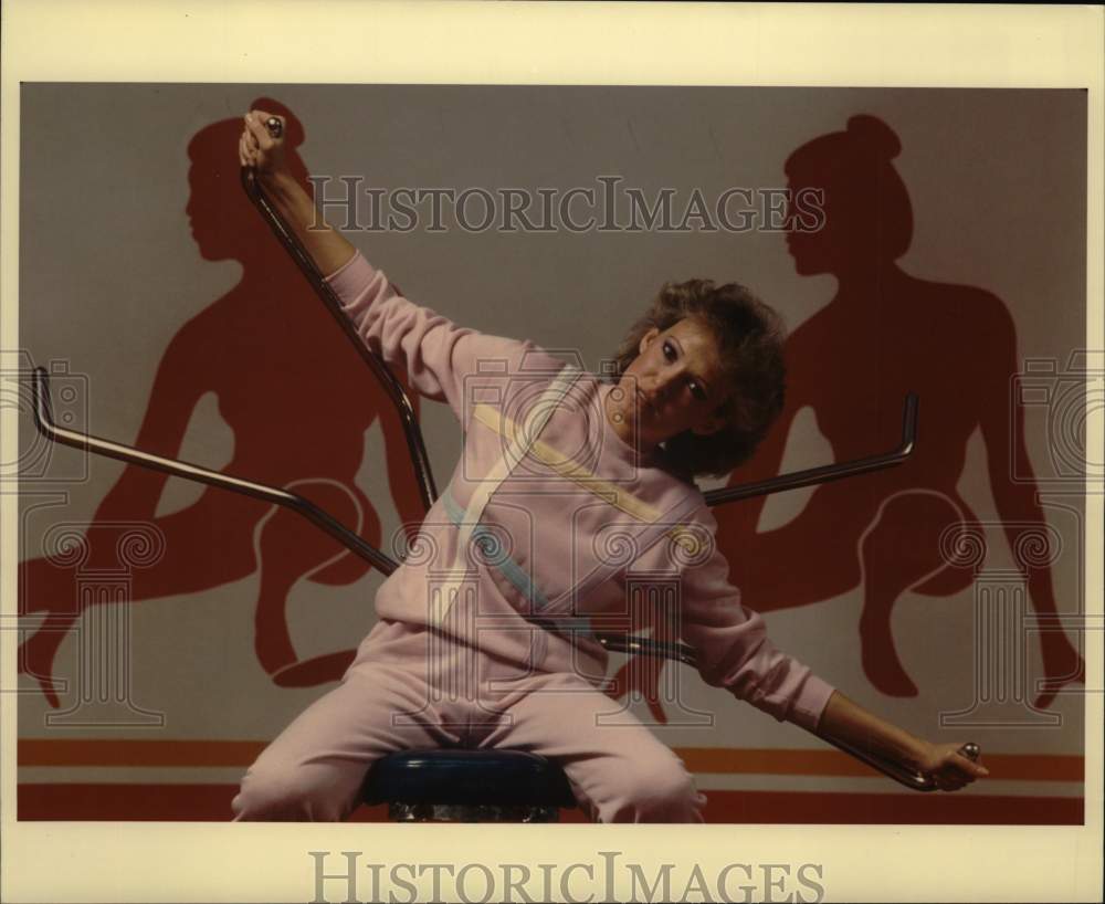 1984 Press Photo Woman models Spring Exercise Fashion on Machine - sya77755- Historic Images