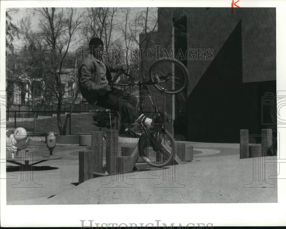 Press Photo Chis Murry Riding Bicycle at Weeks Elementary School Playground- Historic Images