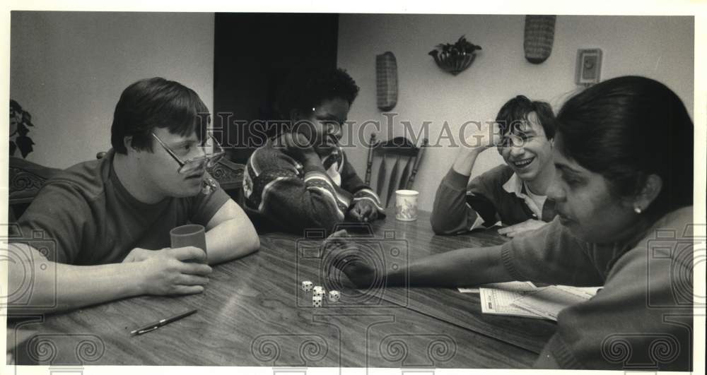 1988 Press Photo Onondaga Association for Retarded Citizens Residents play Game- Historic Images