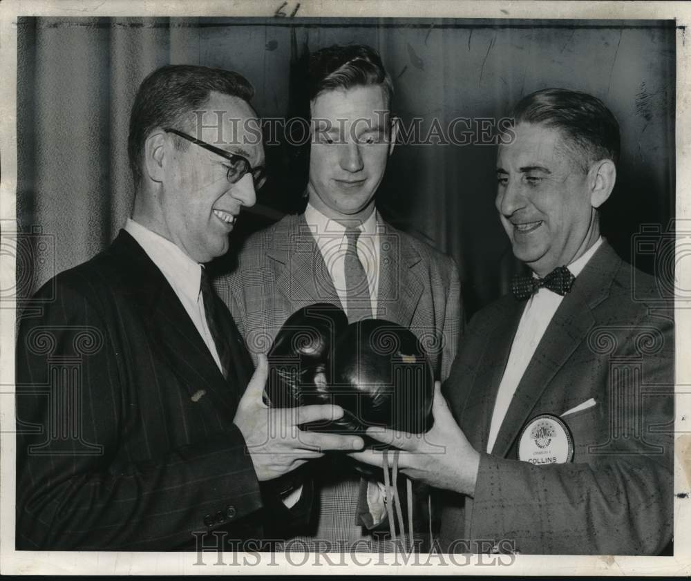 1956 Press Photo Carmen Basilio's Boxing Gloves purchased from March of Dimes- Historic Images