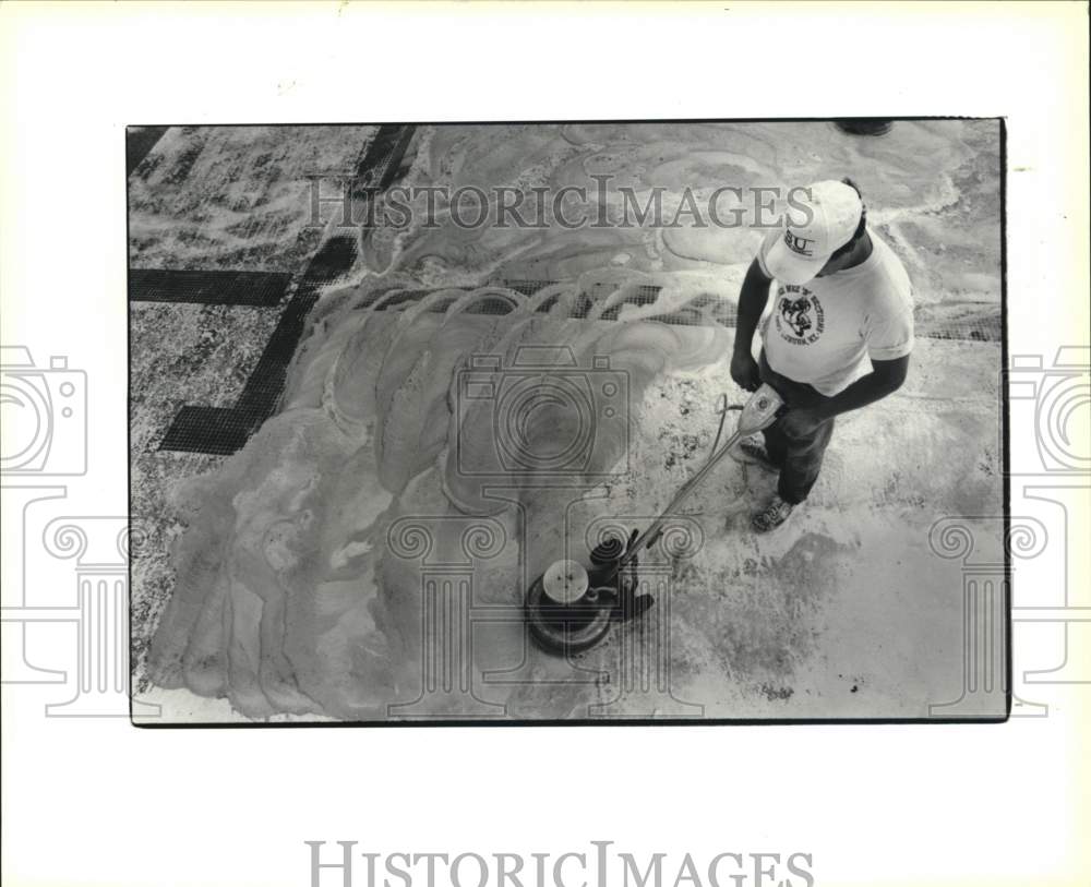 1990 Press Photo Rick Brooks cleans Casey Park Swimming Pool in Auburn, New York- Historic Images