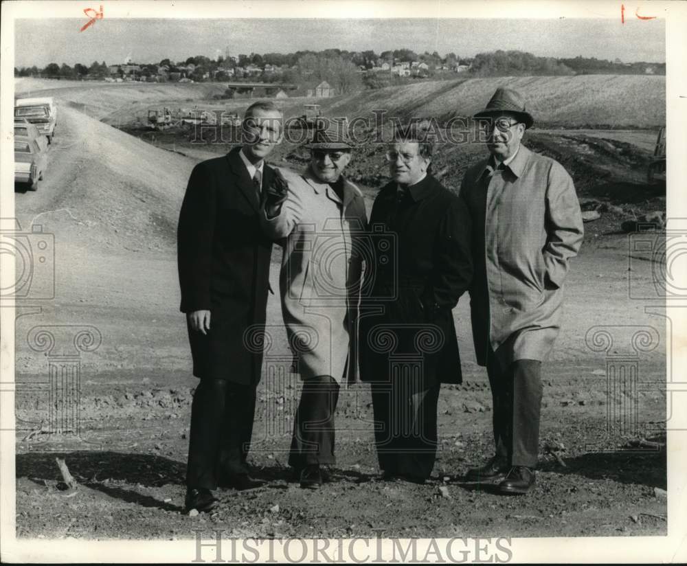1974 Press Photo Officials view renewed construction on Route 5 bypass project.