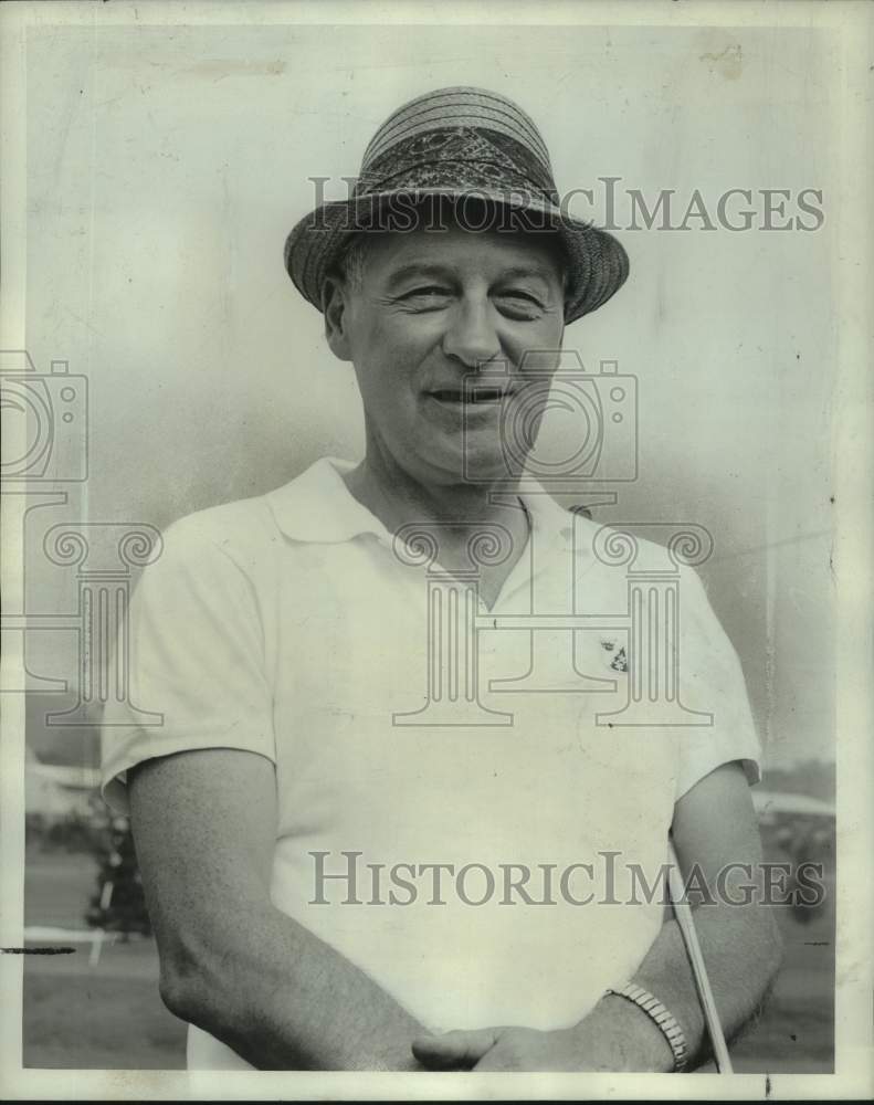 1961 Press Photo Wilbur Lajoy plays golf in the Hole-in-One firing - syp09506- Historic Images