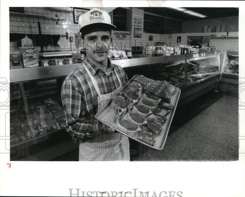 1992 Press Photo Leihs &amp; Steigerwald Meats Employee at Meat Counter - syp30721- Historic Images