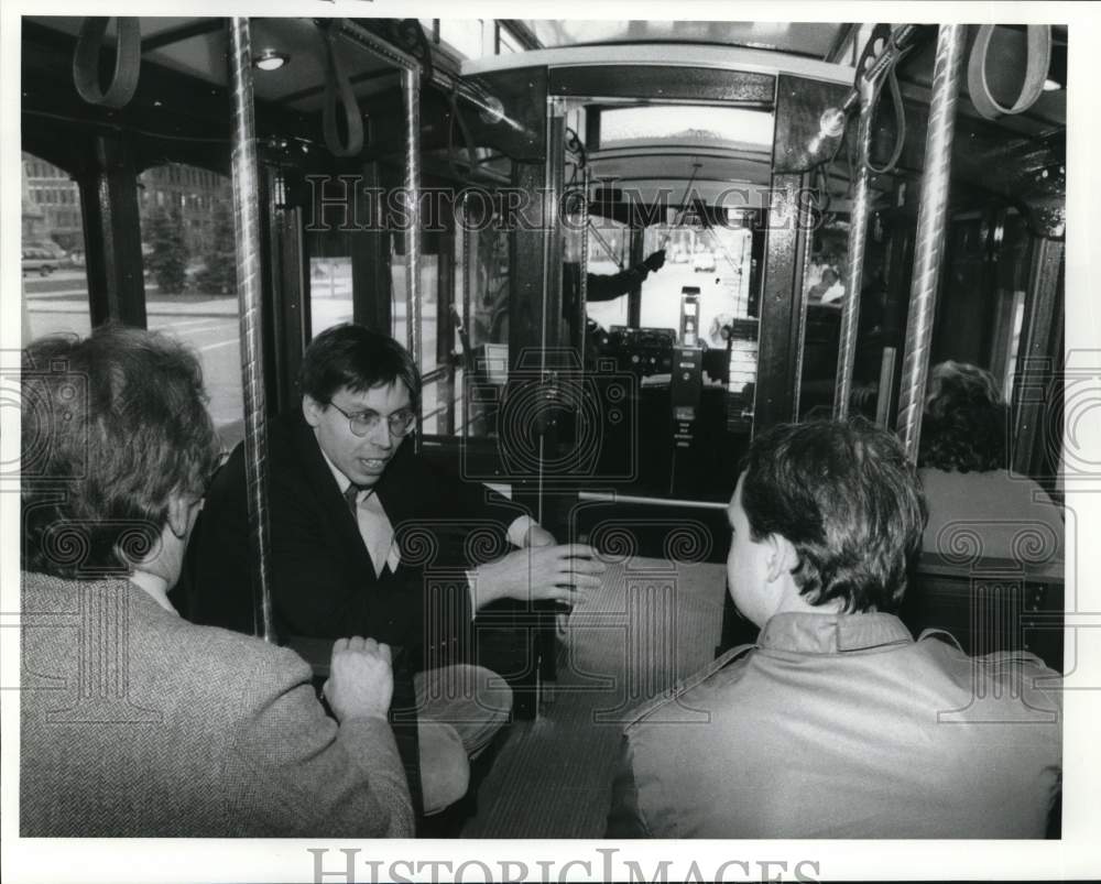 1987 Press Photo Passengers Visiting on Salt City Trolley - syp37896