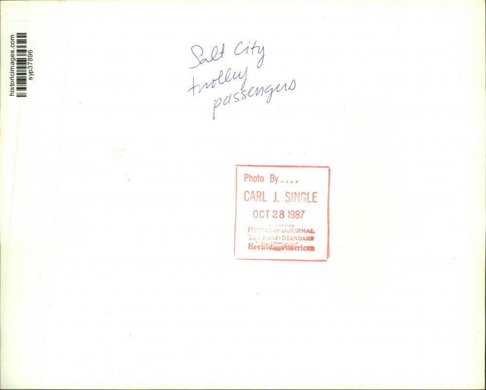 1987 Press Photo Passengers Visiting on Salt City Trolley - syp37896