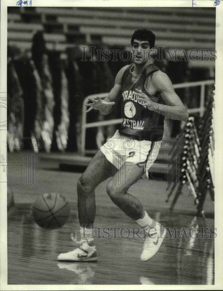 1986 Press Photo Syracuse U basketball player Ron Seikaly dribbles in practice- Historic Images