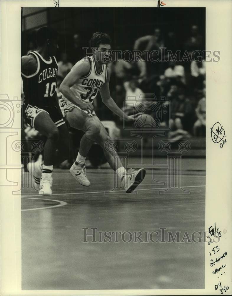 1986 Press Photo Cornell University basketball player John Bajusz dribbles ball- Historic Images