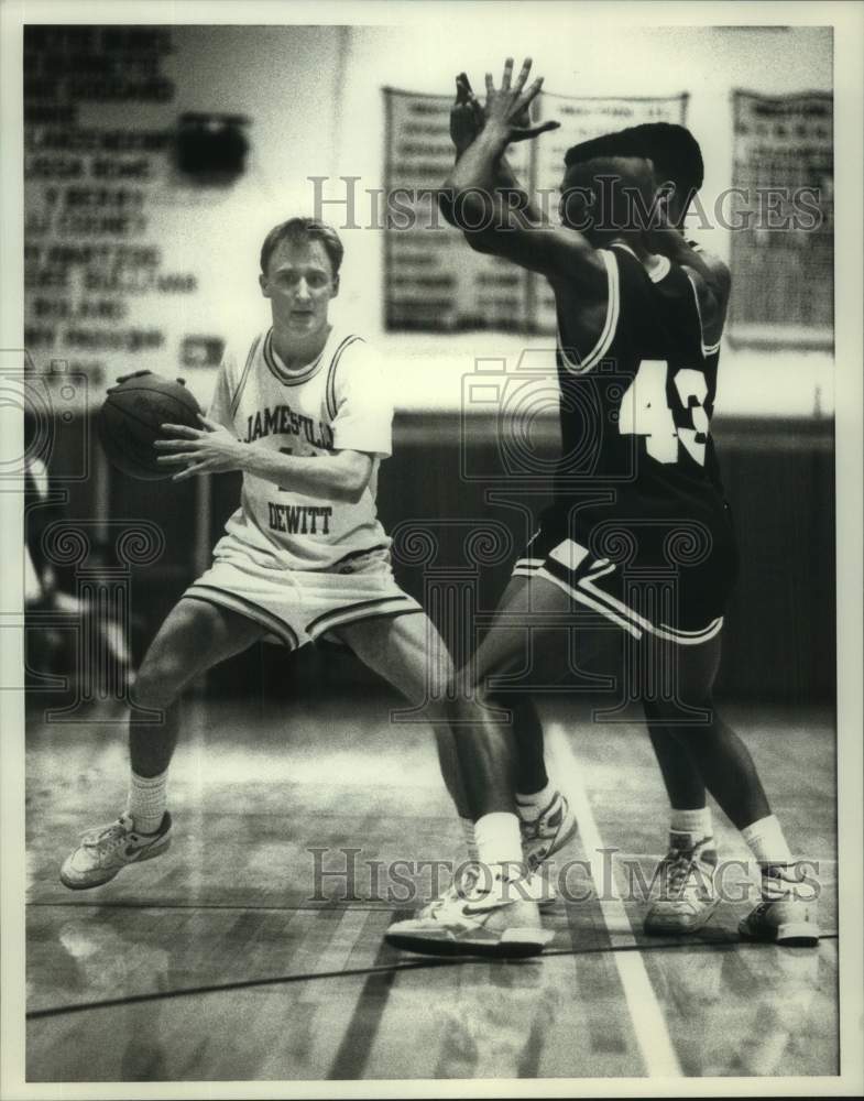 1989 Press Photo Jamesville Dewitt basketball player Ryan Bertram tries to pass- Historic Images