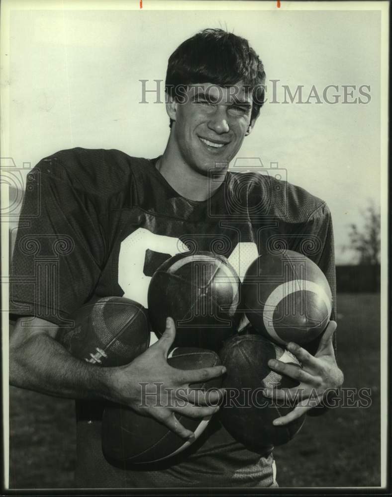 Press Photo Football player Greg Rinaldi holds 5 footballs in practice- Historic Images