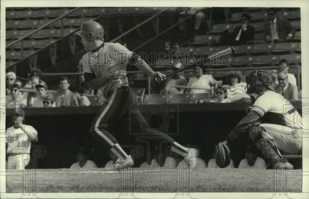 Press Photo LeMoyne College baseball player swings at pitch during game- Historic Images