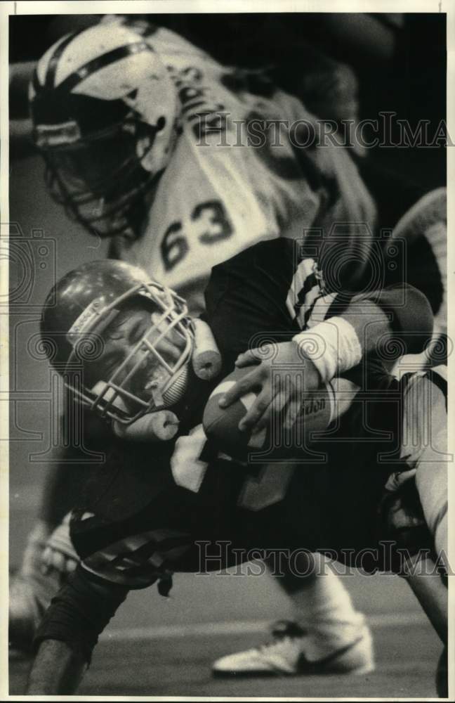 1987 Press Photo Port Byron Football Player Mark Abraham goes down in Game- Historic Images