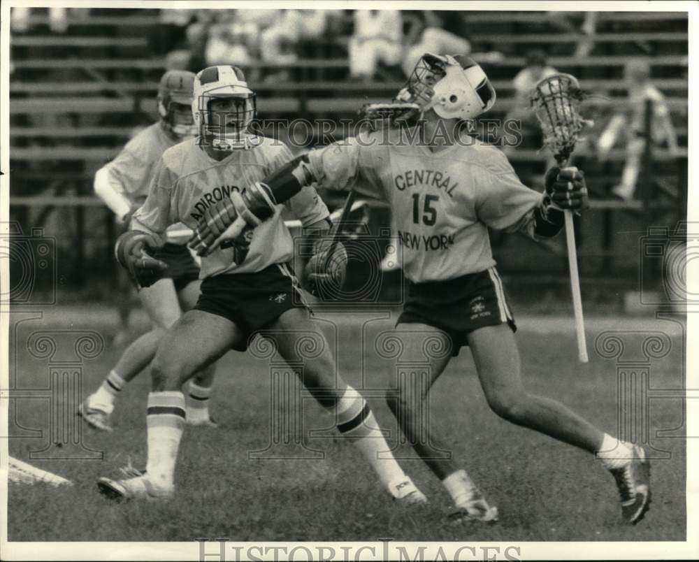 1984 Press Photo Adirondack lacrosse player Mike Rosle battles Josh Dennis- Historic Images