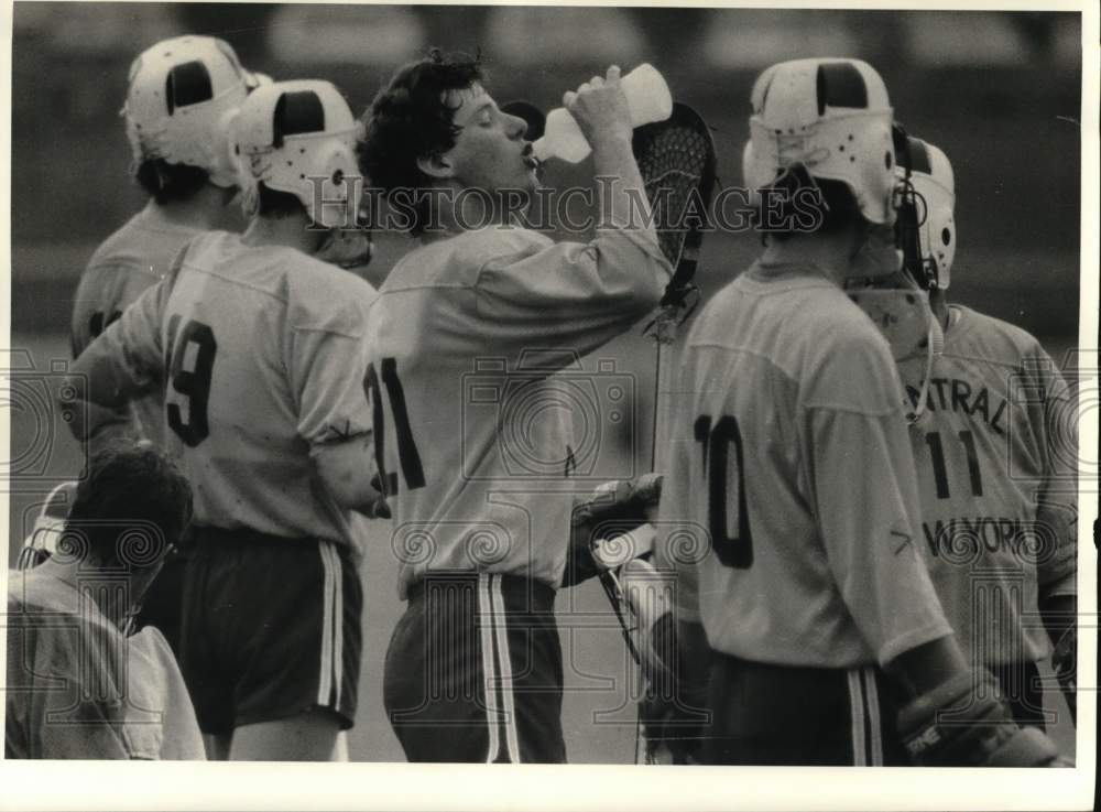 1984 Press Photo Central New York lacrosse player John McAuliffe drinks water- Historic Images